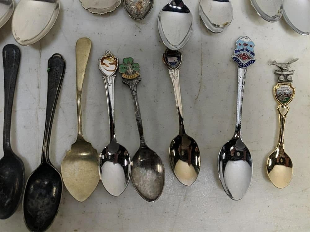 46 Collector Spoons, Napkin Ring And Pocket Knife