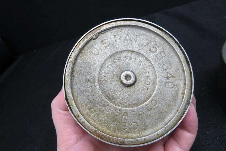 Two (2) metal coin banks