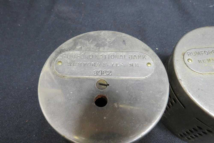 Two (2) metal coin banks