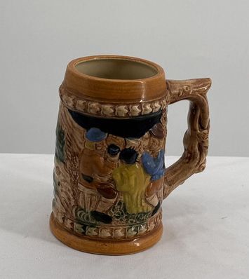 Vintage Ceramic Beer Stein Mug with Scenic Relief Design and Tree Handle