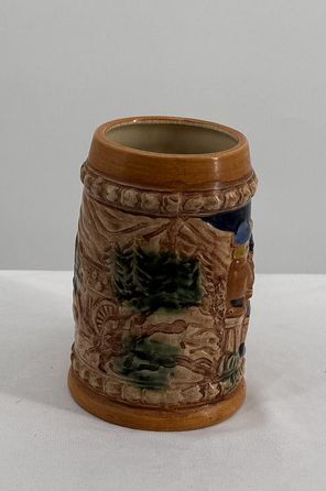 Vintage Ceramic Beer Stein Mug with Scenic Relief Design and Tree Handle